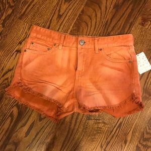 Free People NWT distressed copper colored shorts